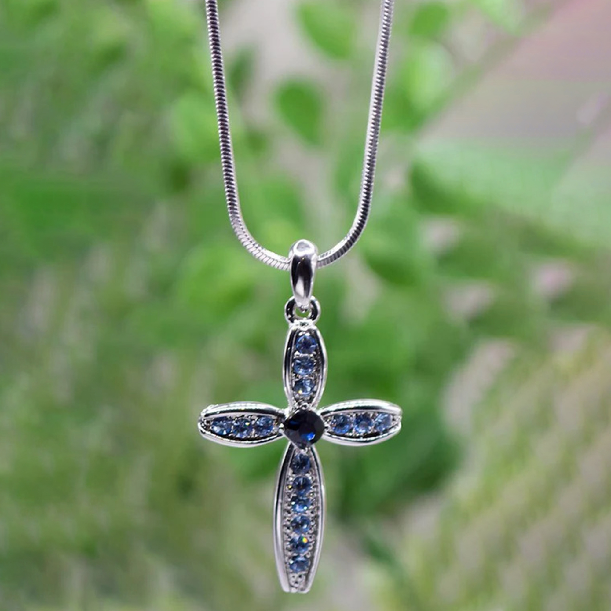 Necklace-Eden_Merry-Cross-Blue.png